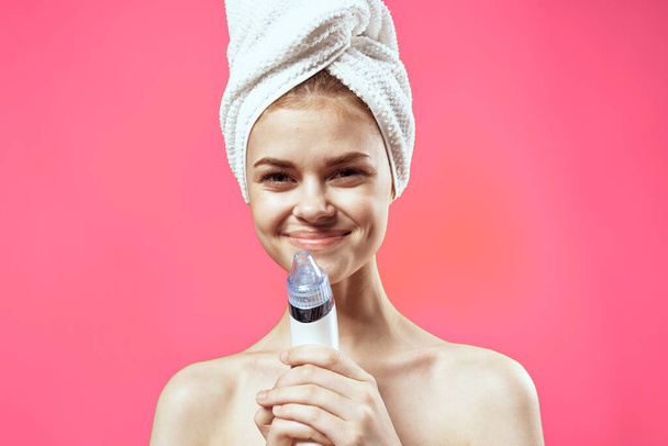 woman with bare shoulders cleaning skin spa treatments pink background - Photo, image