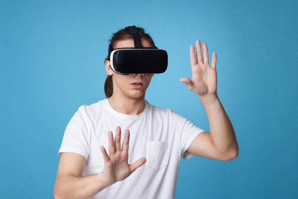 Young man using virtual reality headset. VR gadgets - Foto, Imagen
