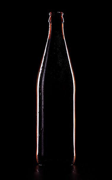 Beer Bottle On Black - 写真・画像