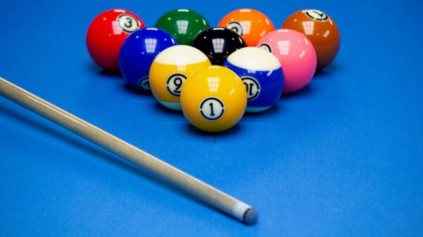 Billiard balls in a blue pool table. Selective focus - Photo, Image