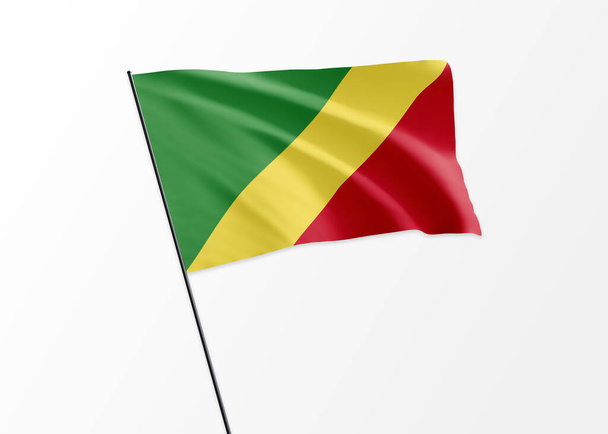 Flaga Republiki Konga wznosząca się wysoko w odizolowanej republice w dniu niepodległości Konga - Zdjęcie, obraz
