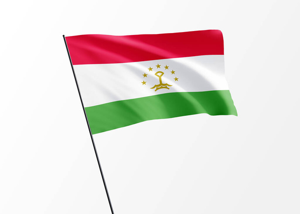 Flaga Tadżykistanu powiewająca wysoko w odosobnionym tle Dzień niepodległości Tadżykistan Światowa kolekcja flag narodowych - Zdjęcie, obraz