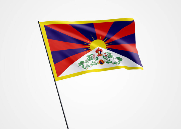 チベットの隔離された背景に高く飛んでいます。2月13日チベット独立記念日。世界国旗コレクション世界国旗コレクション - 写真・画像
