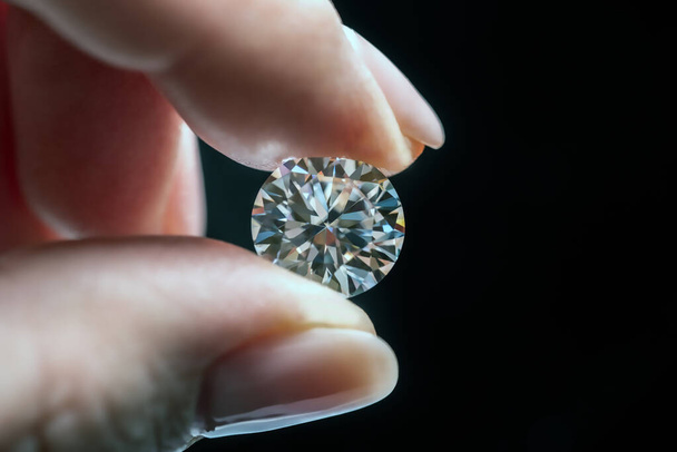 Female hand with luxury diamond - Foto, imagen