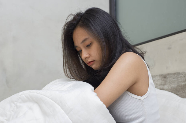 Asian young beautiful women look sad, disappointed and lonely at home - Fotoğraf, Görsel