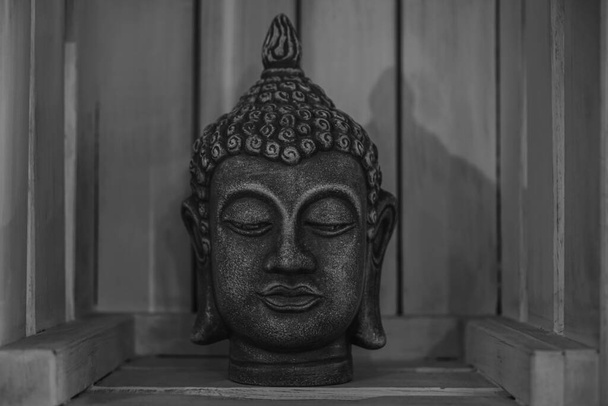 Buddha statue used as amulet  in  Buddhism religion. Head of Buddha image.  - Fotoğraf, Görsel