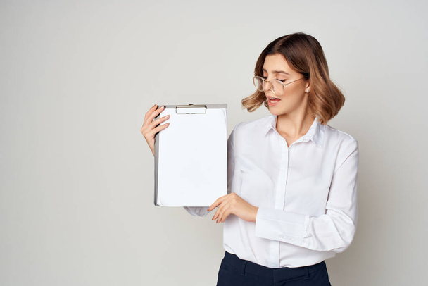 female manager with folder for papers Professional isolated background - Foto, Imagem