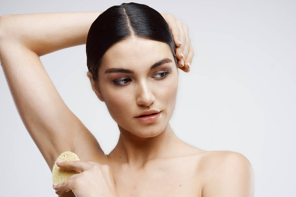 woman with bare shoulders skin care cream rejuvenation - Foto, Imagem