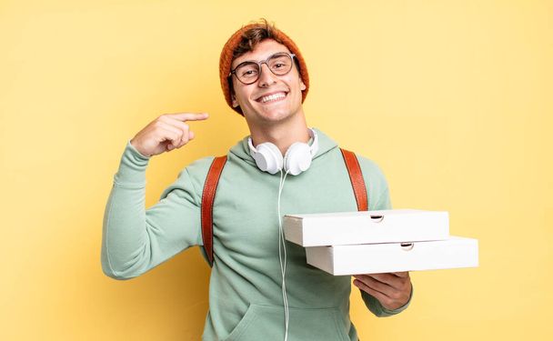 smiling confidently pointing to own broad smile, positive, relaxed, satisfied attitude. pizza concept - Photo, Image