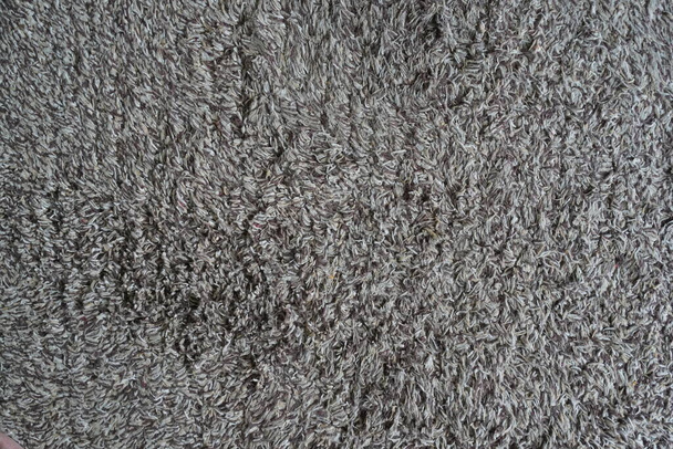 Close up used white - gray - brown doormat for any old vintage design style. - Photo, Image