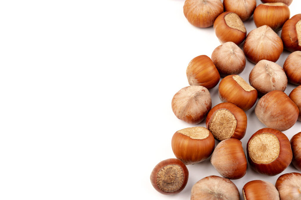 Hazel nuts on a white background. Hazelnut background, healthy food - Photo, Image