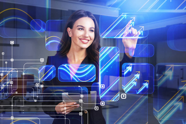 Businesswoman wearing formal suit is holding tablet. Digital interface with holograms and virtual display with rising arrows in the foreground. Concept of international cooperation - Foto, Imagem