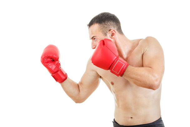 puolella näkymä lihaksikas aikuinen nyrkkeilijä mies valmis taistelemaan
 - Valokuva, kuva