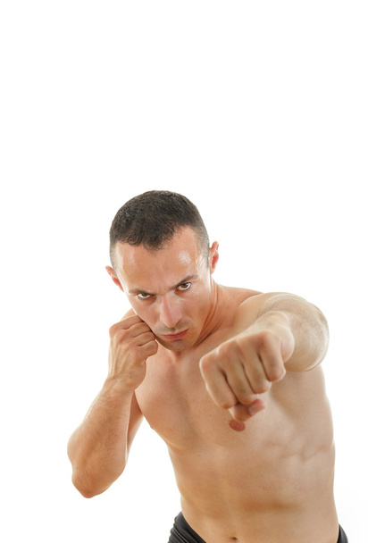 Портрет серьезного спортсмена боксера-фихтера в боевой позиции
 - Фото, изображение