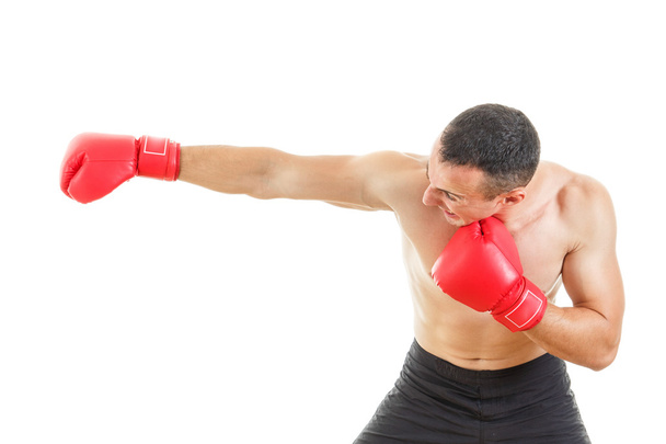 oldalnézet ütő egyenes ellen egy fehér backgro férfi Boxer - Fotó, kép
