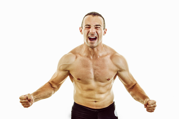 Vahva lihaksikas mies kehonrakentaja valmis taistelemaan voitosta
 - Valokuva, kuva