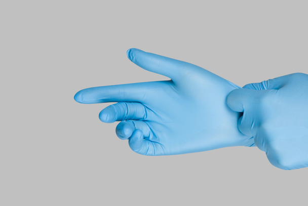 blauwe handschoenen - Foto, afbeelding