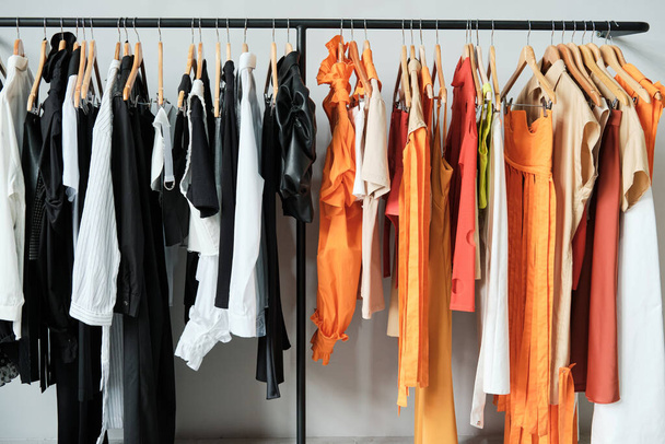 New clothes hanging on the rack - Photo, Image