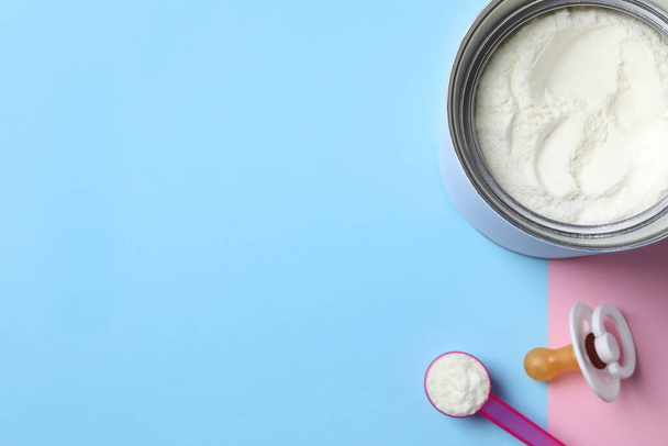 Flat lay composition with powdered infant formula on color background, space for text. Baby milk - Fotoğraf, Görsel