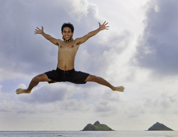 Asian man jumping in the air - Zdjęcie, obraz