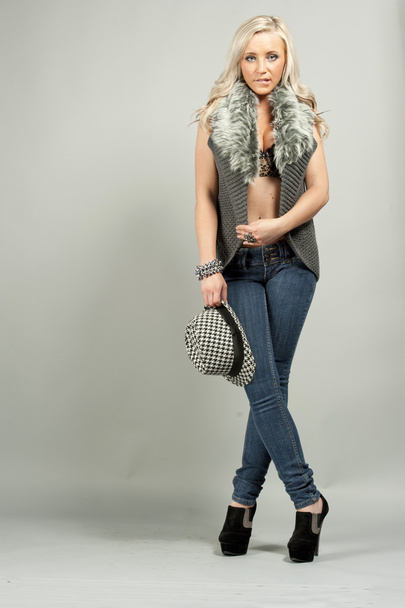 Young female model wearing jeans - Φωτογραφία, εικόνα