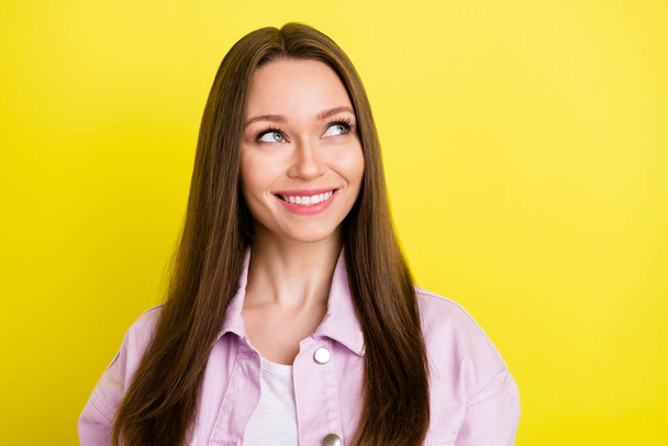 Photo of sweet brunette hairdo millennial lady look empty space wear pink shirt isolated on yellow color background - Φωτογραφία, εικόνα
