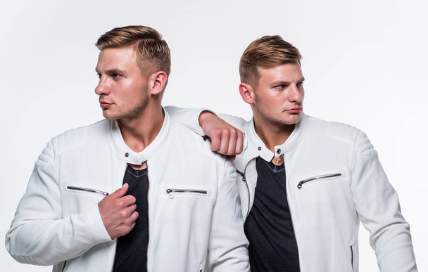 two blonde cousin. young confident brothers. confident casual models. twins brother in white - Fotografie, Obrázek