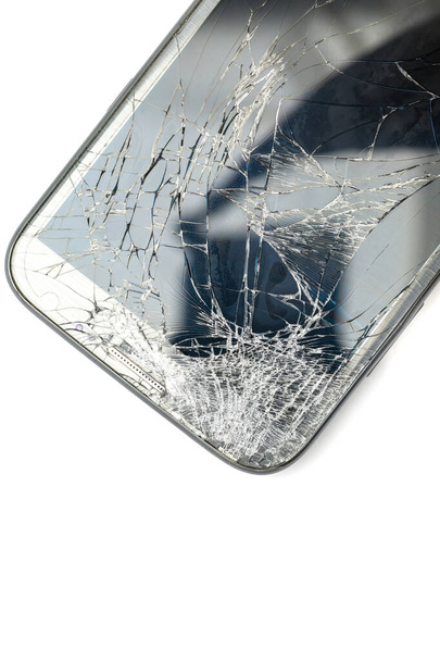 Close up of broken screen smart phone isolated on white background - Fotografie, Obrázek