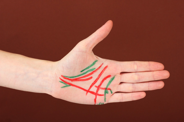 Chiromancy.Color contours on palm, on color background - Foto, Bild