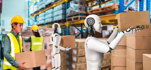 Innovativo robot industriale che lavora in magazzino insieme al lavoratore umano - Foto, immagini