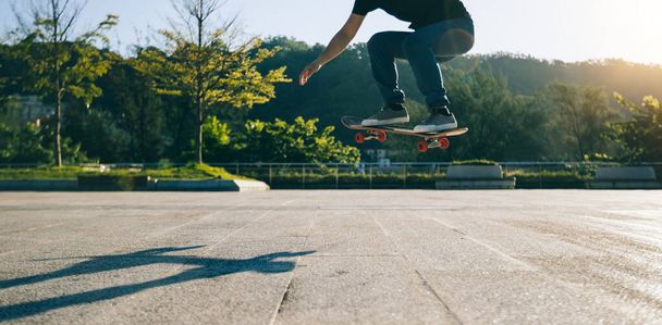 Skateboarder skateboarding outdoors in city - Photo, Image
