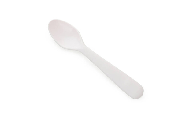 Single plastic spoon isolated on white background - Photo, Image