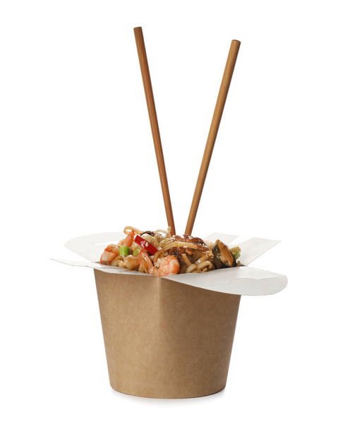 Box of wok noodles with seafood and chopsticks isolated on white - Fotoğraf, Görsel