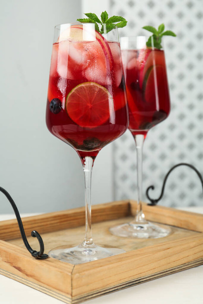 Delicious Red Sangria with fruits on white wooden table - Foto, Imagem