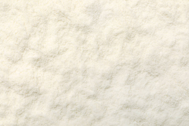 Closeup view of powdered infant formula as background. Baby milk - Foto, Imagem