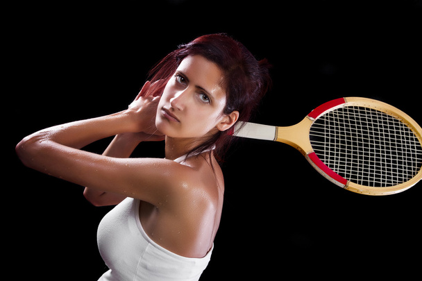 Beautiful young girl  playing tennis - Foto, afbeelding