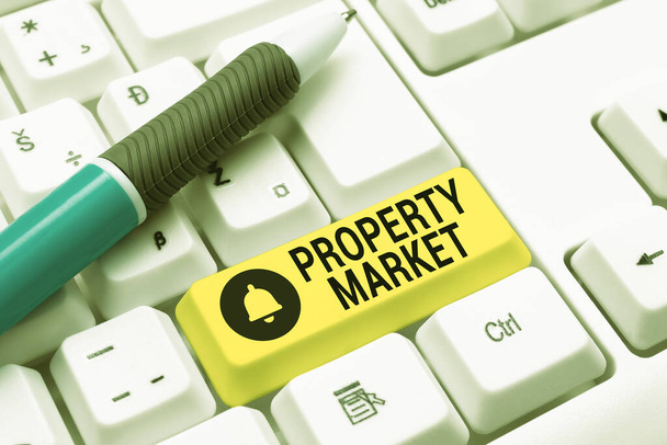 Text showing inspiration Property Market. Business concept the buying and selling of land and buildings Estate market Typing Online Network Protocols, Creating New Firewall Program - Photo, Image