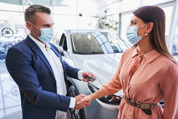Car dealership following the safety measures of the pandemic - Photo, Image