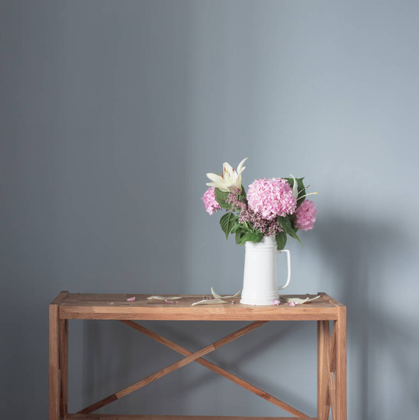 summer flowers in white jug on wooden shelf - Fotoğraf, Görsel