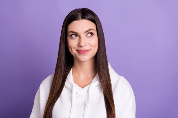 Photo of young dreamy charming happy woman look empty space idea smile isolated on violet color background - Zdjęcie, obraz