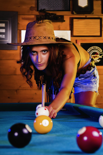 Beautiful cowgirl on a snooker club. - Photo, Image
