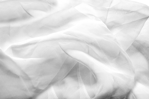 Texture backdrop photo of white colored net folded cloth. - Photo, Image