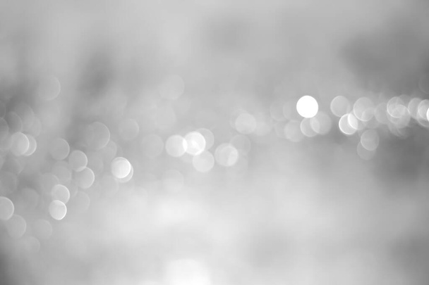 white glitter vintage lights background. white bokeh background - Fotografie, Obrázek