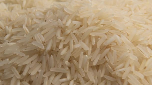 Weißer Reis in Großaufnahme dreht sich im Kreis - Filmmaterial, Video