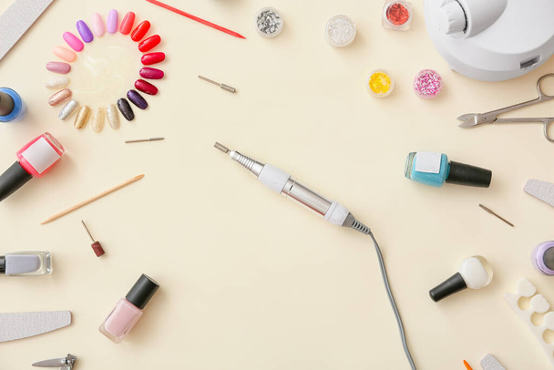 Set of tools for manicure on color background - Foto, Imagem