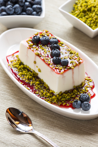  fancy panna cotta with blueberries and pistachio - 写真・画像