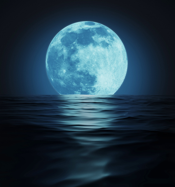Big Blue Moon Reflected in Dark Wavy Water Surface - Photo, Image