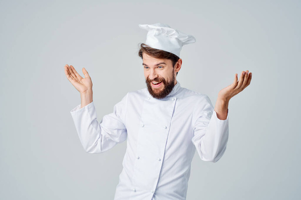 miespuolinen kokki ravintola palvelujen tarjonta eristetty tausta - Valokuva, kuva