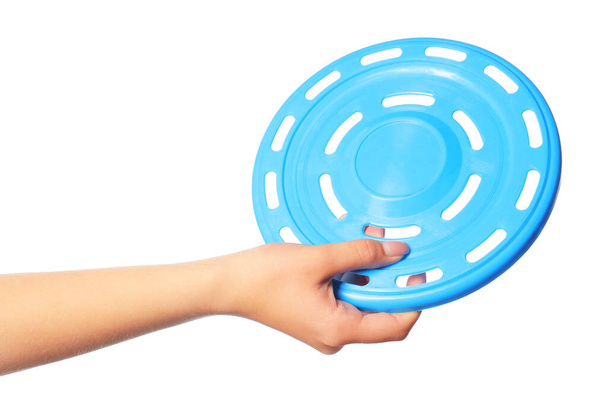 Woman holding frisbee disk on white background - Foto, imagen