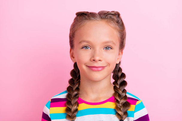 Photo of cheerful positive small lady braids hairstyle smile wear striped shirt isolated pink color background - Fotografie, Obrázek